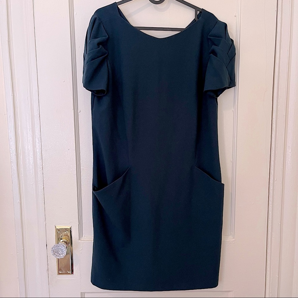 Dark green mini dress with ruffle shoulder
